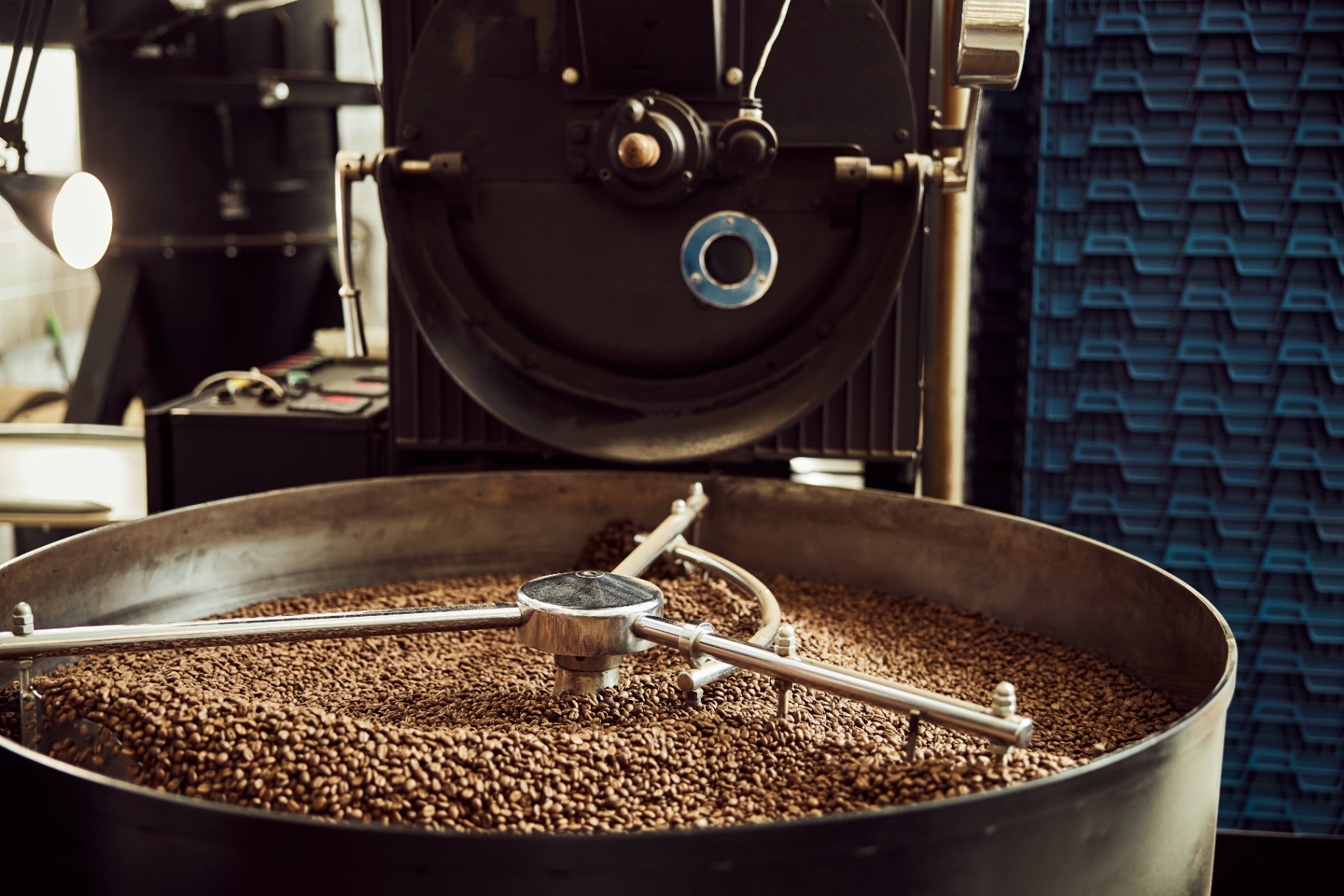 Coffee roasting machine full of freshly roasted beans
